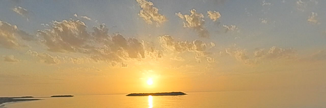 Image of a spectacular sunset reflecting off Lake Erie at Presque Isle State Park Pennsylvania